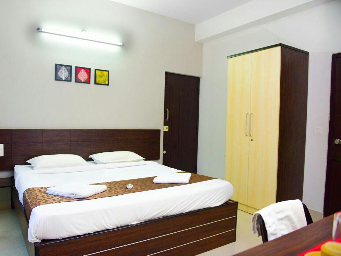 Varsha Enclave- Trinity House Aparthotel Mysore Bagian luar foto